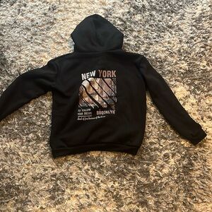 Black sweatshirt with new york design on back
